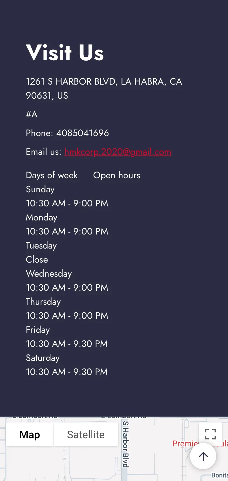 Original Pho Lily & Mongolian BBQ visit and hours page on a phone, showing the address, an unformatted phone number and the opening hours.